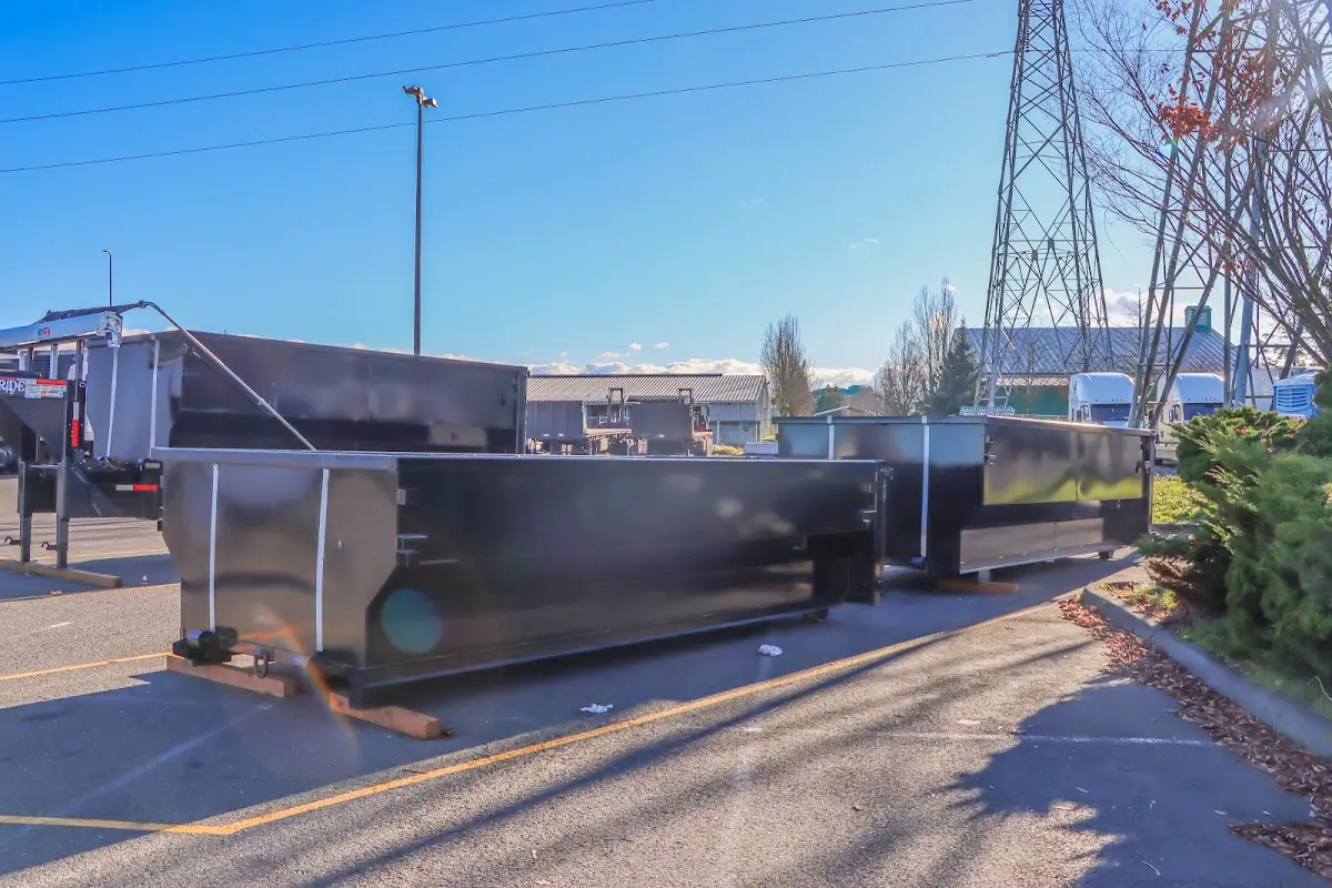 Roll-off dumpster ready for waste disposal at job site for Demolition Dumpster Rental in Ogden